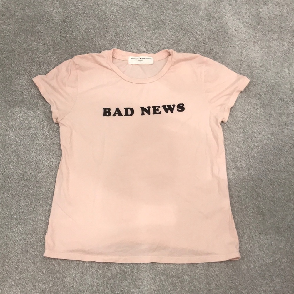 Light pink “bad news” cropped t-shirt